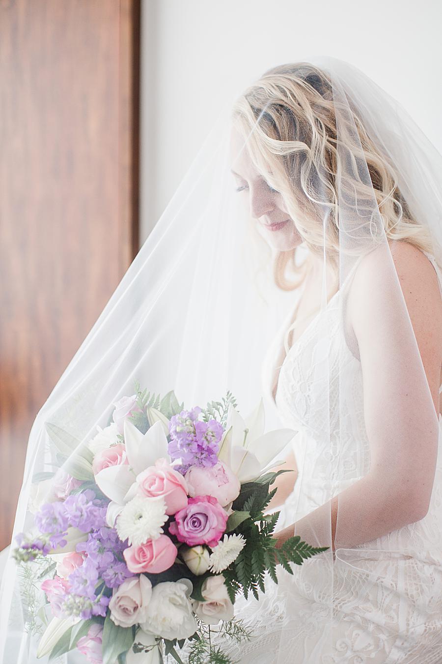 Under the veil pose at this Dayton wedding by Knoxville Wedding Photographer, Amanda May Photos.