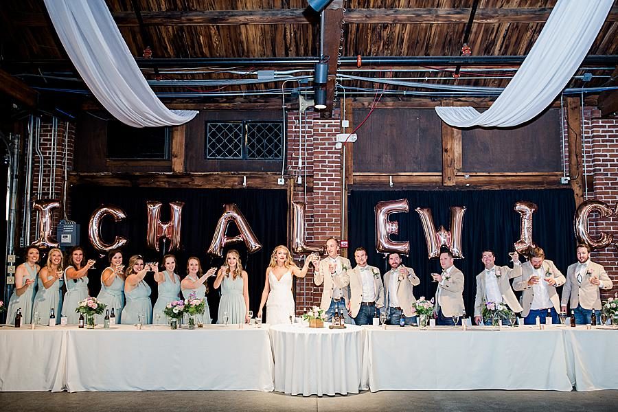 Wedding toast at this Dayton wedding by Knoxville Wedding Photographer, Amanda May Photos.
