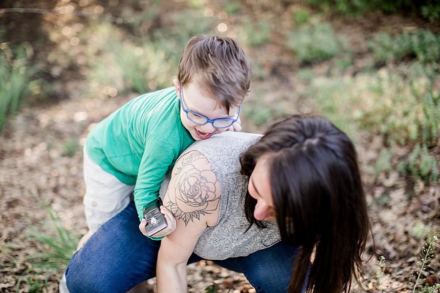 Wrestling at this Mommy & Me Session by Knoxville Wedding Photographer, Amanda May Photos.