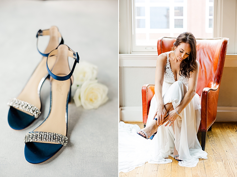 bride putting on shoes at this urban elopement