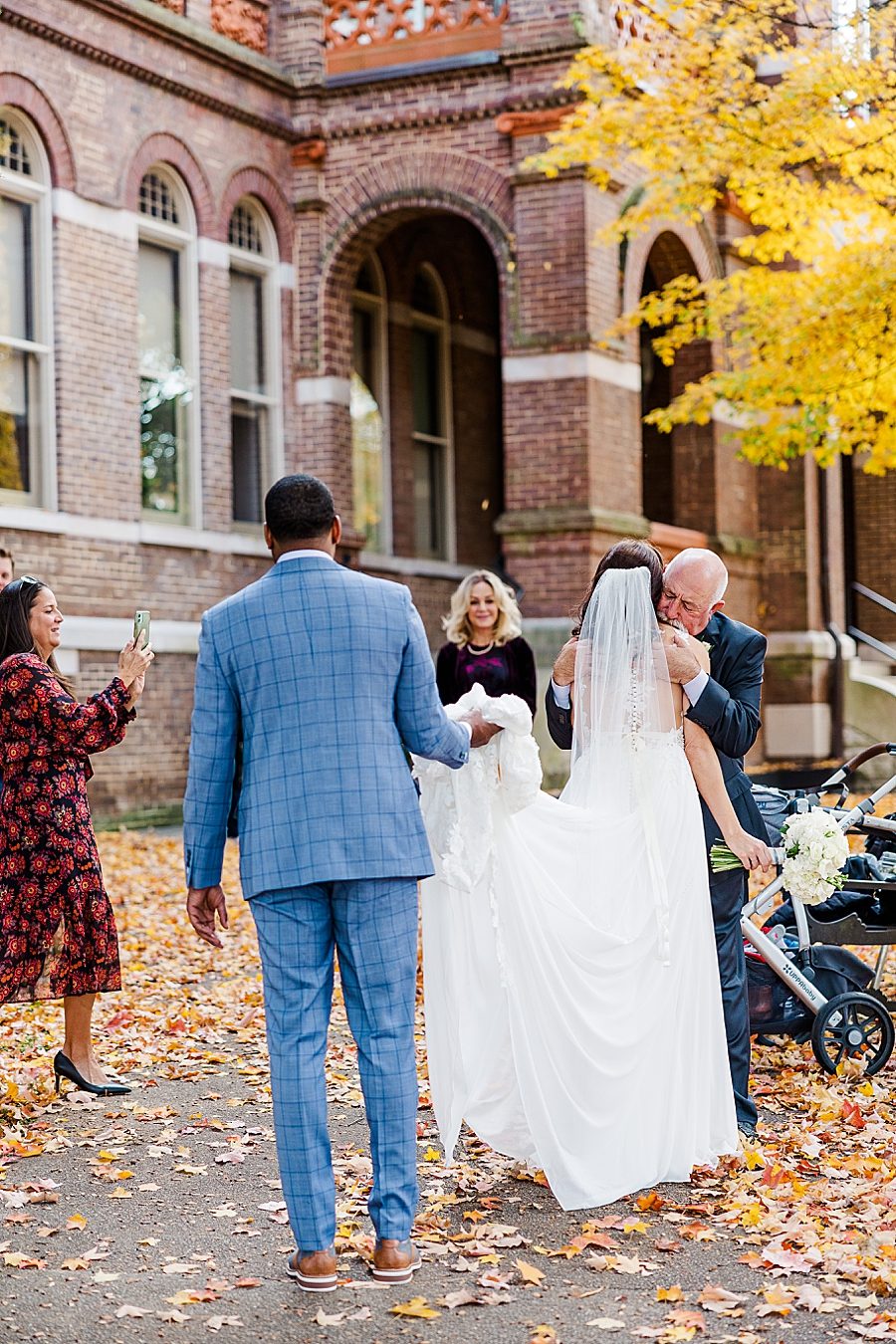 father giving away bride at this urban elopement