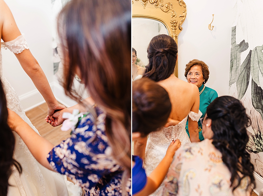 zipping the dress at this vietnamese wedding