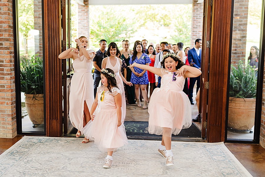 flower girls coming into reception