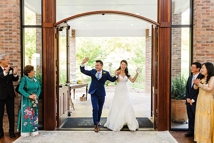 couple entering reception