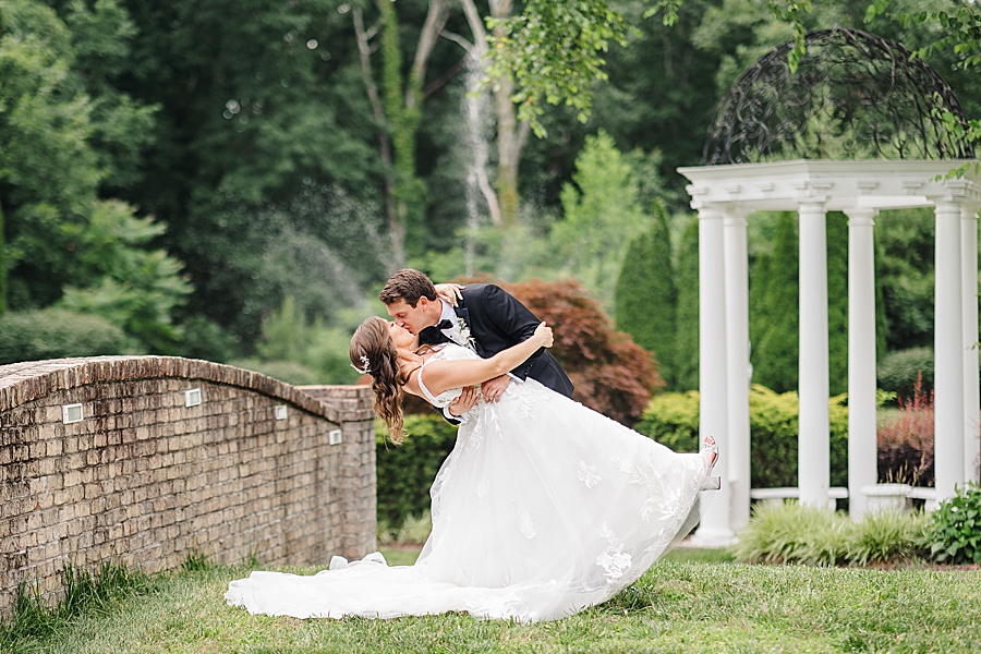 dip kiss at vineyard wedding at castleton