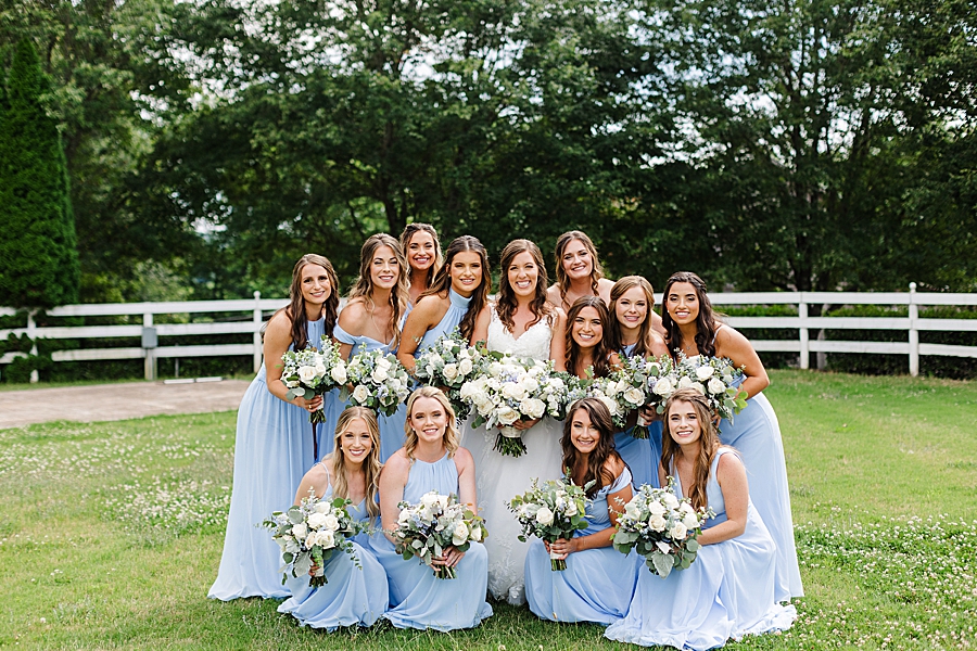 bridesmaids posing at vineyard wedding at castleton