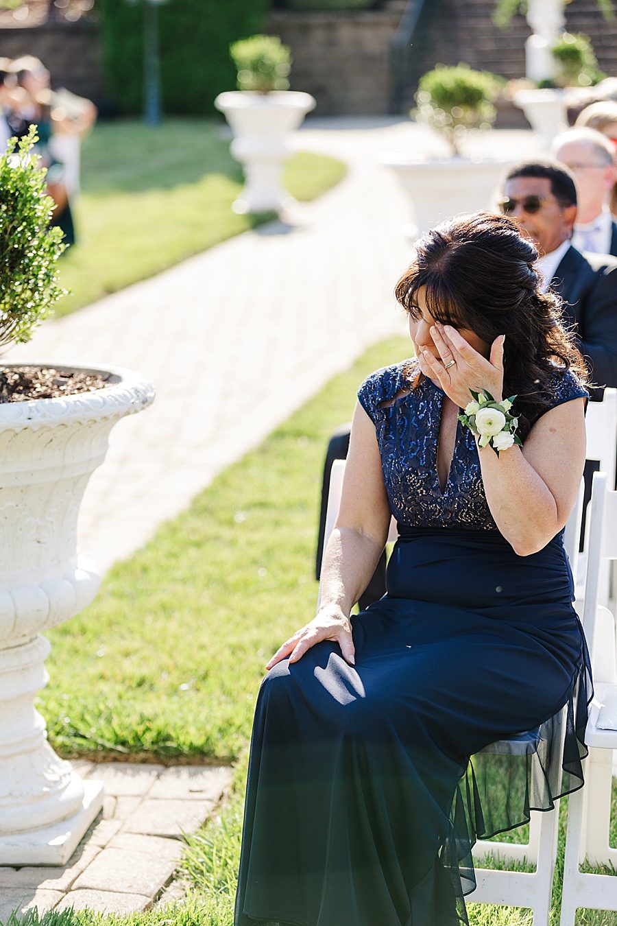 teary mother of the bride at vineyard wedding at castleton