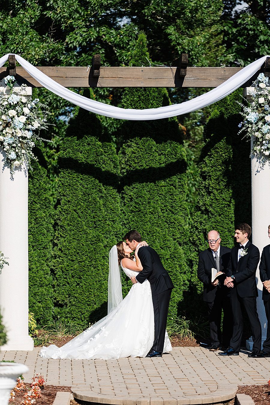 you may kiss the bride at vineyard wedding at castleton