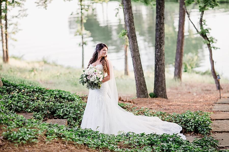 Bride by the water at this WindRiver Bridal Portraits by Knoxville Wedding Photographer, Amanda May Photos.