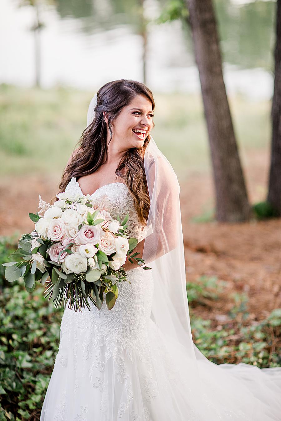 Happy bride at this WindRiver Bridal Portraits by Knoxville Wedding Photographer, Amanda May Photos.