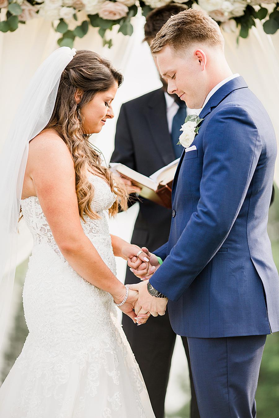 Praying at this WindRiver Wedding Day by Knoxville Wedding Photographer, Amanda May Photos.