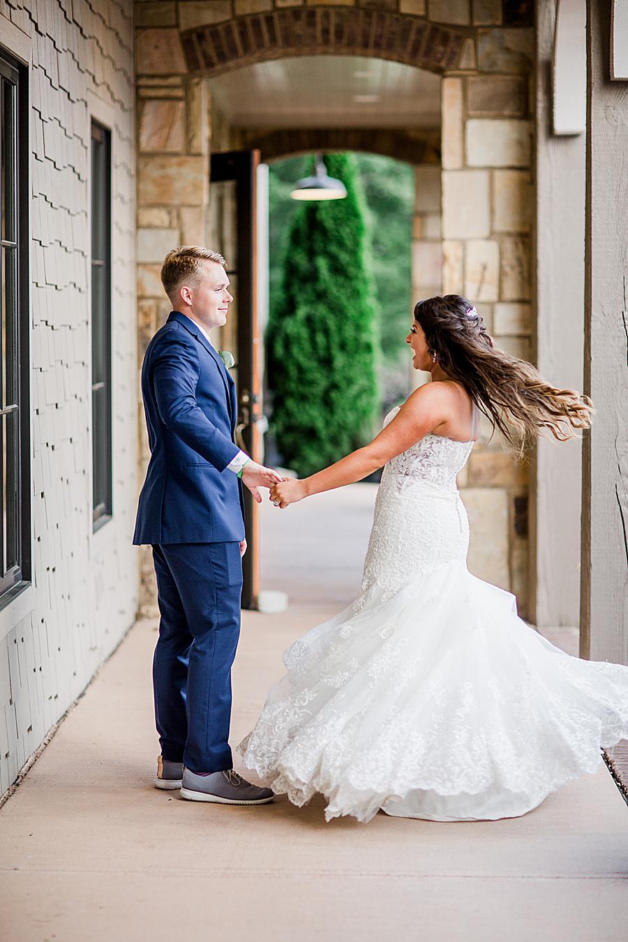 Twirling the bride at this WindRiver Wedding Day by Knoxville Wedding Photographer, Amanda May Photos.