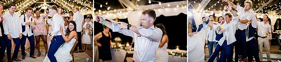 Garter toss at this WindRiver Wedding Day by Knoxville Wedding Photographer, Amanda May Photos.