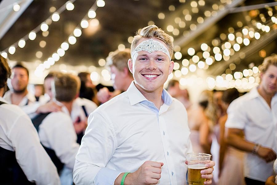 Groom wearing headband at this WindRiver Wedding Day by Knoxville Wedding Photographer, Amanda May Photos.