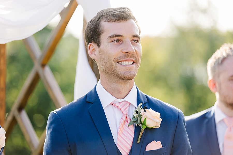 groom's reaction to bride walking down the aisle at this windriver wedding