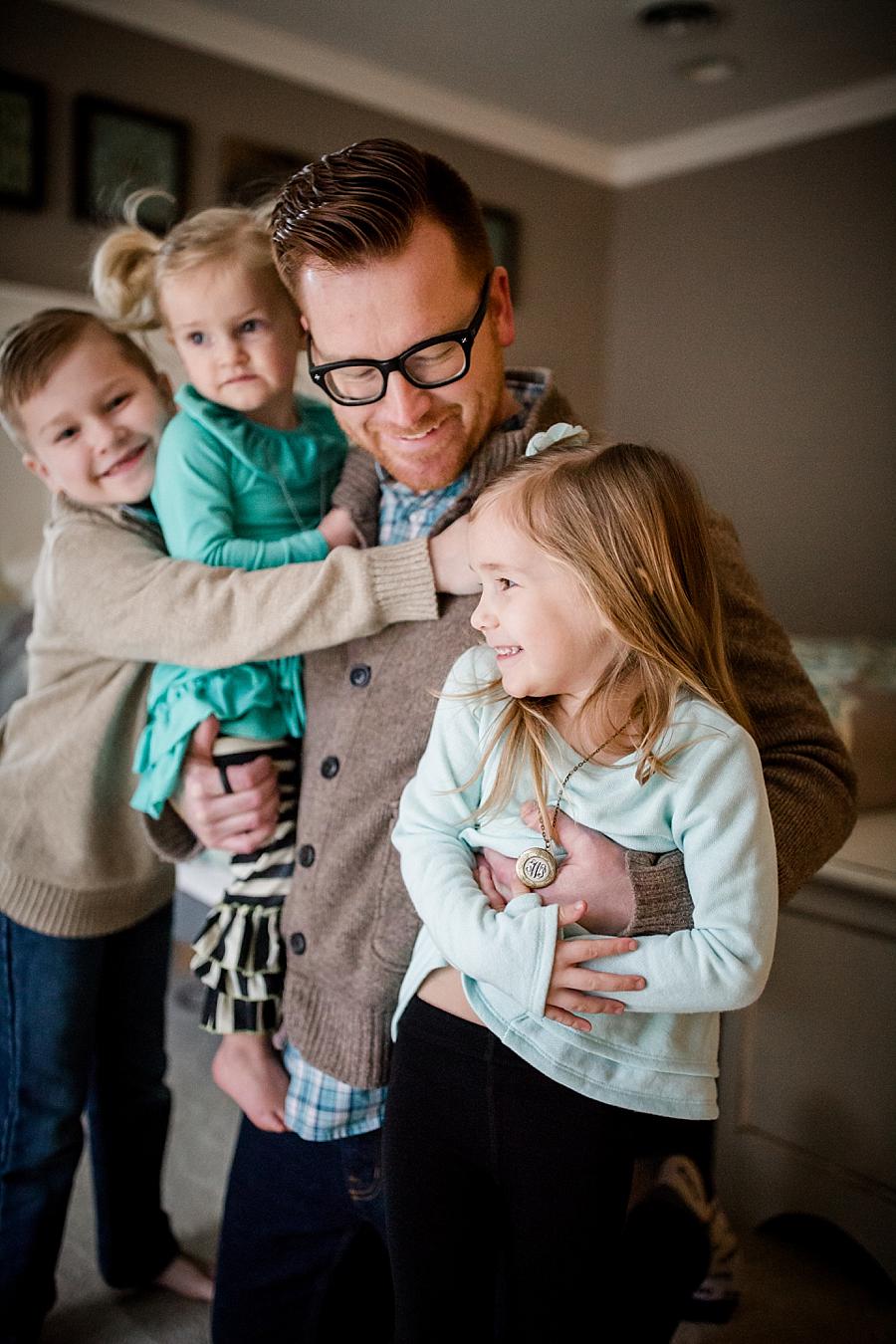 All his older kids and dad at this lifestyle family session by Knoxville Wedding Photographer, Amanda May Photos.