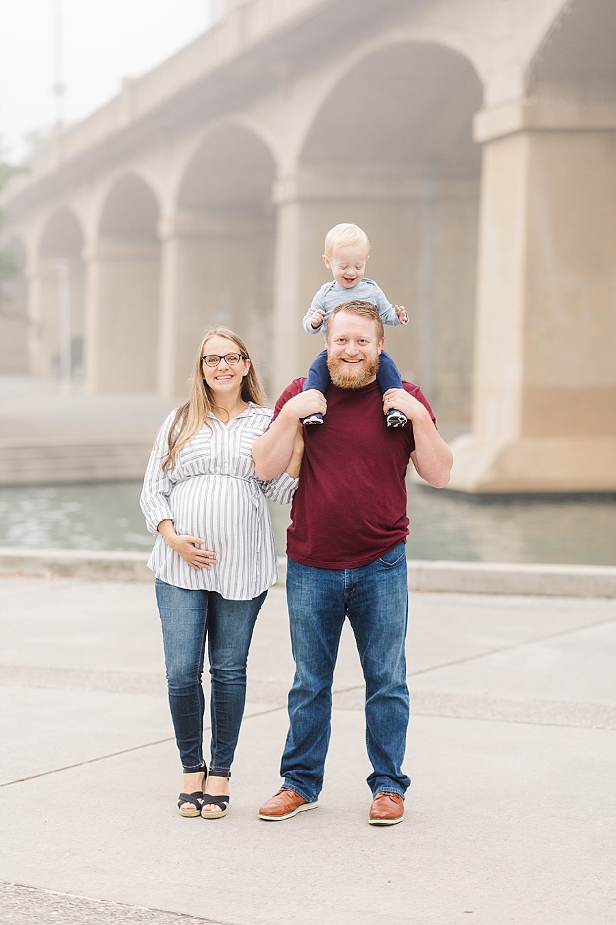 family of four at this world's fair site sunrise maternity session