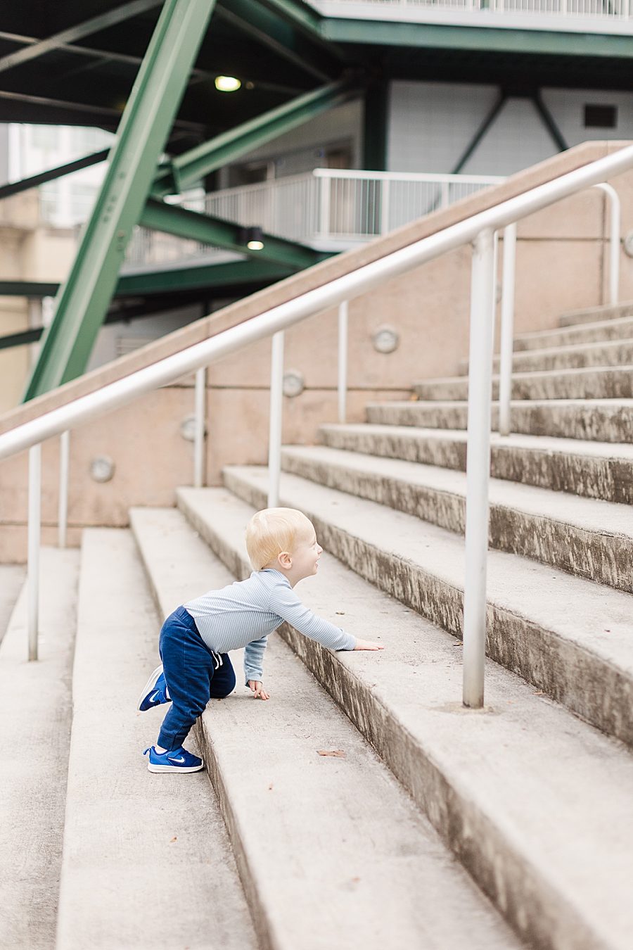 little boy climbing stairs