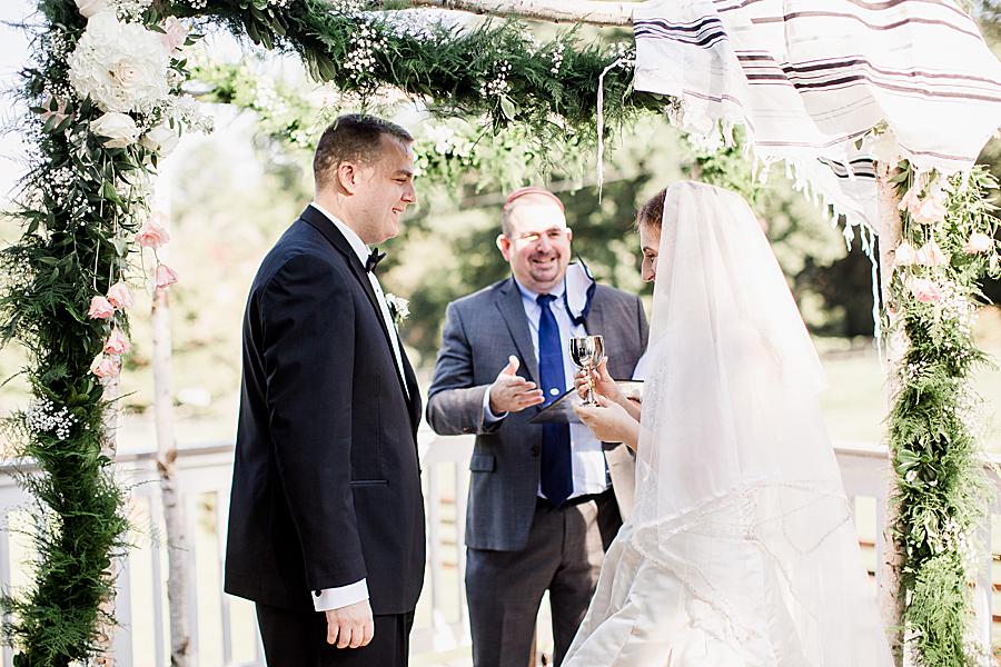 under the chuppah at airbnb elopement