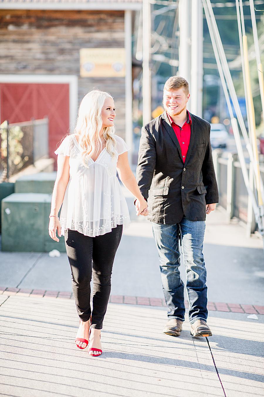 Walking down the street at this Apple Barn engagement by Knoxville Wedding Photographer, Amanda May Photos.