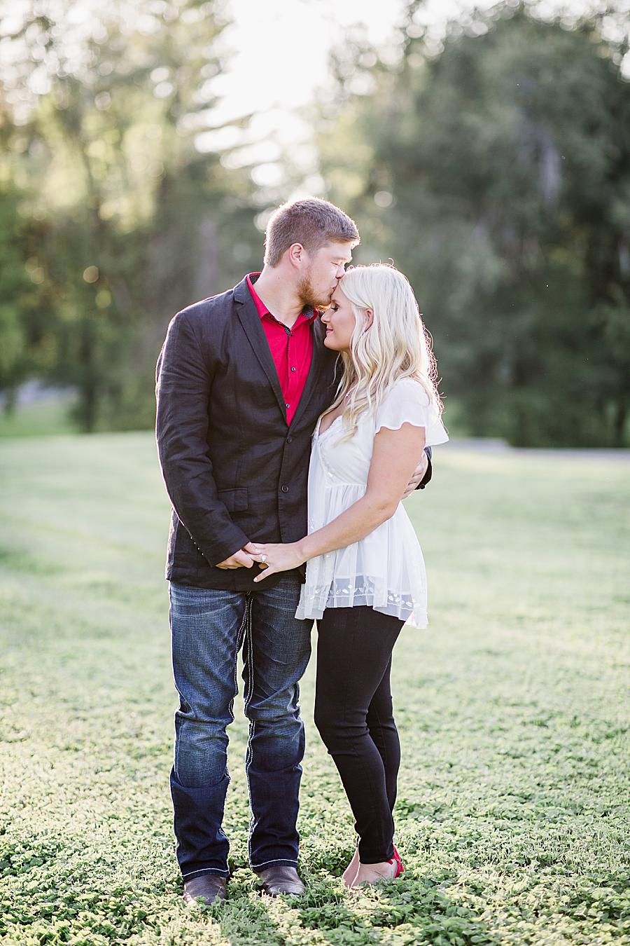 Forehead kiss at this Apple Barn engagement by Knoxville Wedding Photographer, Amanda May Photos.