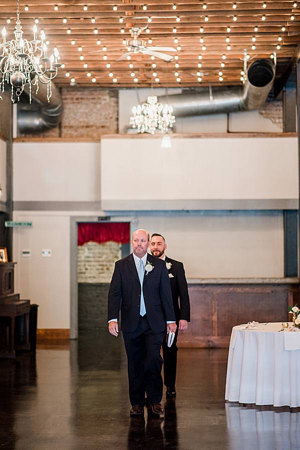 groom entering ceremony by associate photographer