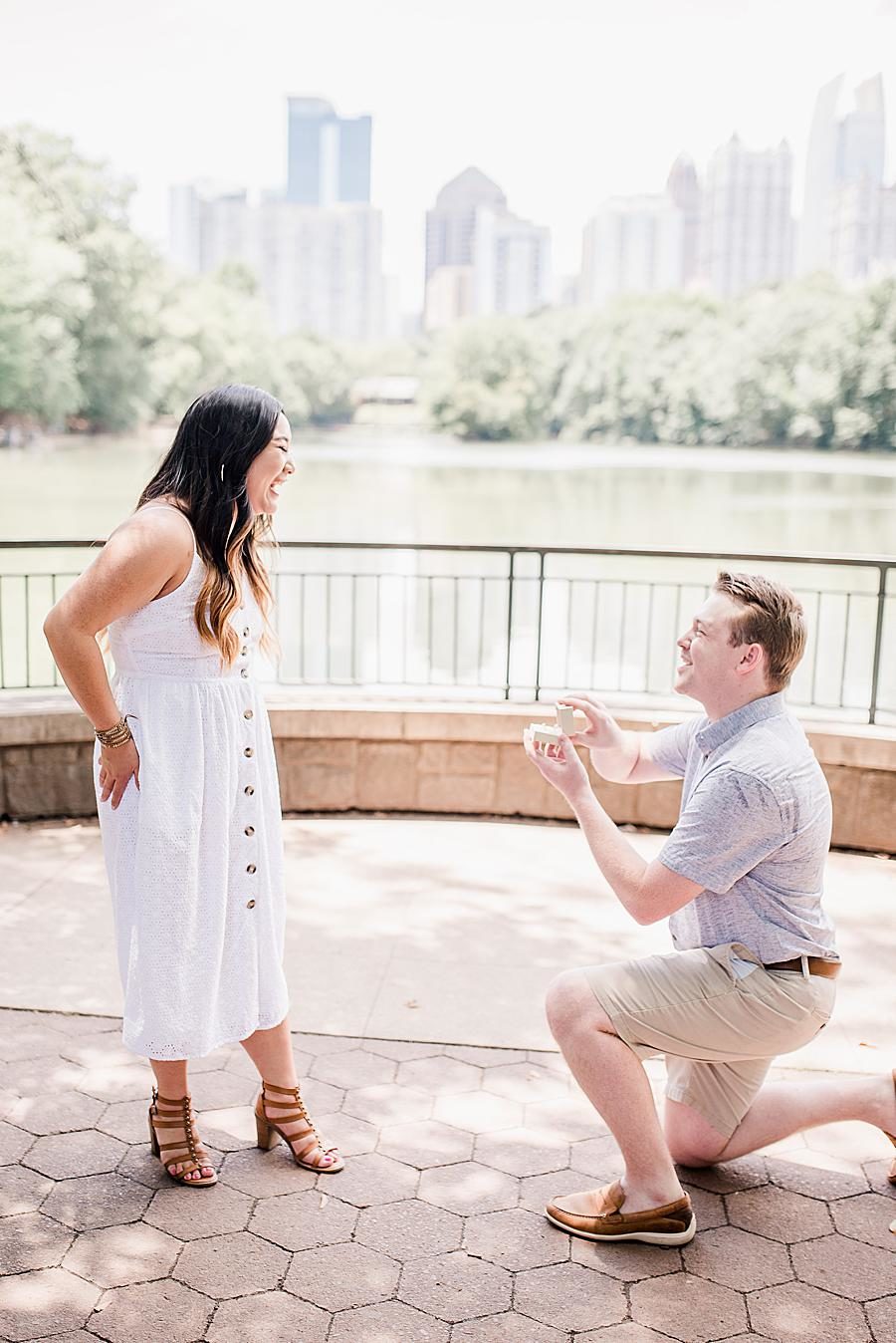 Popping the question at this Piedmont Park Proposal by Knoxville Wedding Photographer, Amanda May Photos.