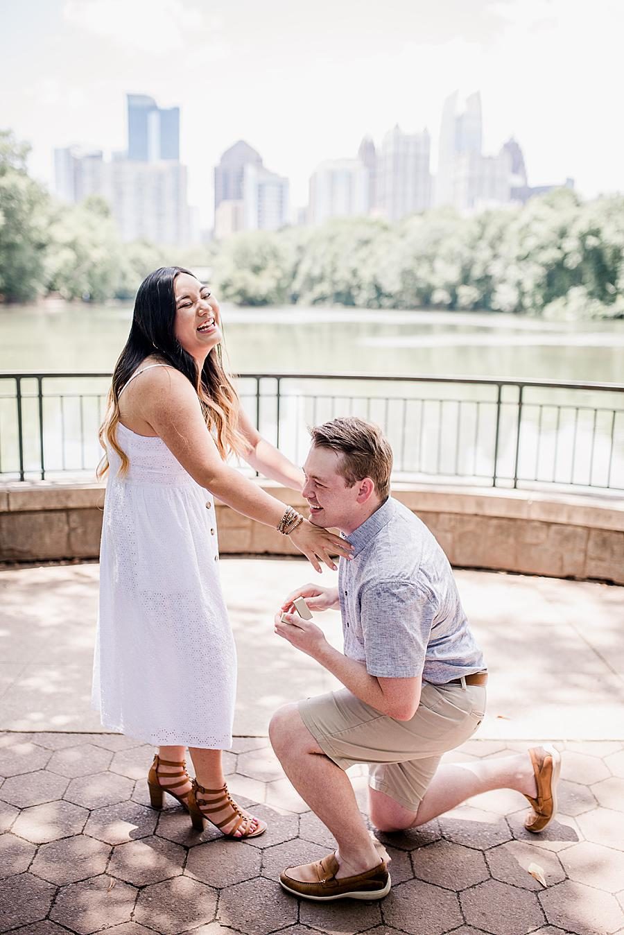 Just engaged at this Piedmont Park Proposal by Knoxville Wedding Photographer, Amanda May Photos.
