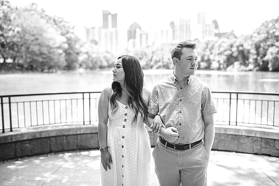 Arm in arm at this Piedmont Park Proposal by Knoxville Wedding Photographer, Amanda May Photos.