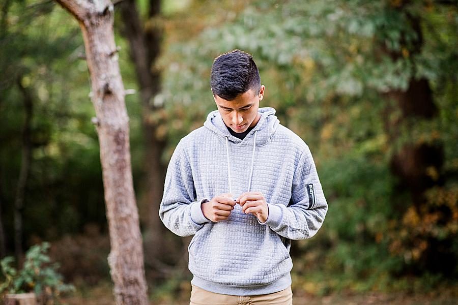 Gray hoodie at this Church Camp Senior Session by Knoxville Wedding Photographer, Amanda May Photos.