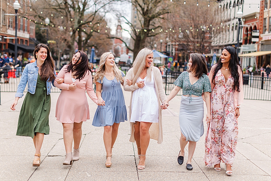 girls walking together bridesmaid proposal