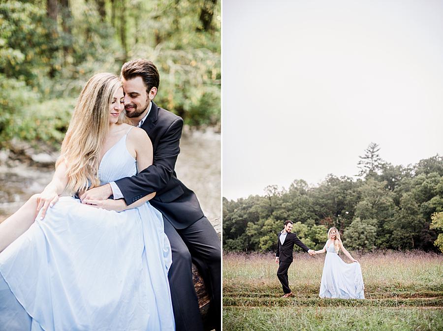 holding dress train at cades cove engagement session