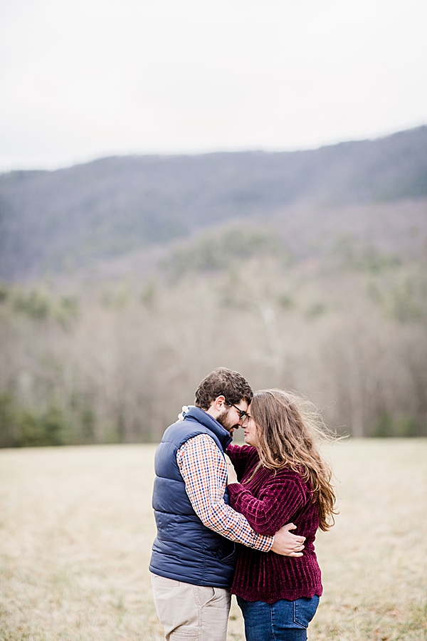 foreheads together at cades cove proposal