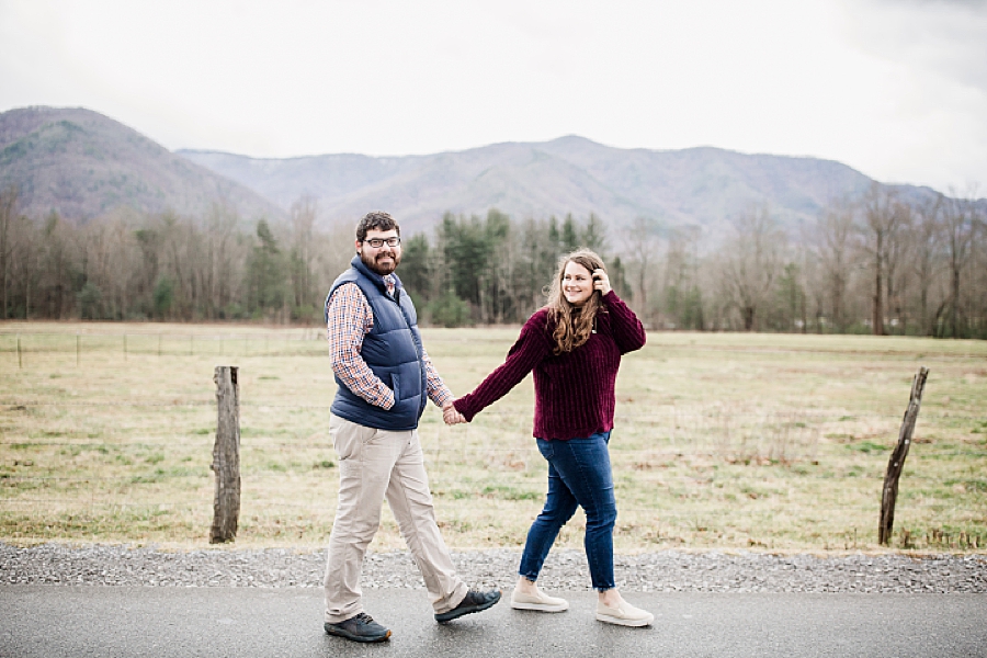 holding hands at cades cove proposal