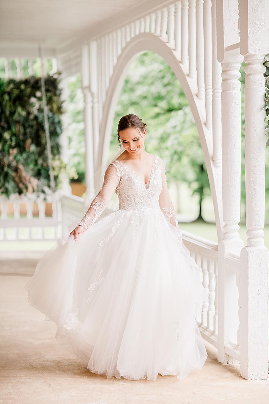 Twirling at this Cardwell Manor Wedding by Knoxville Wedding Photographer, Amanda May Photos.