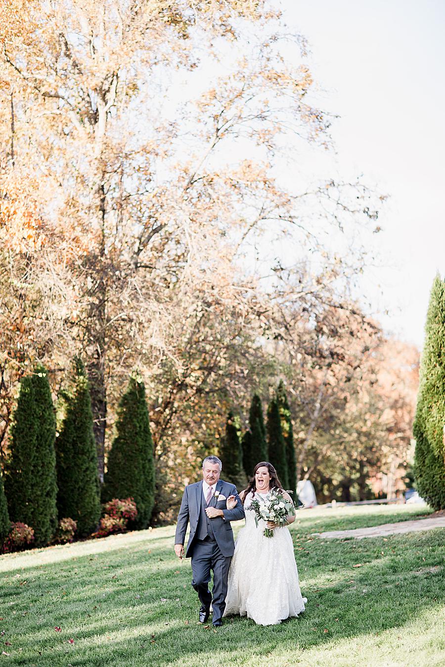Walking down the aisle at this Wedding at Castleton Farms by Knoxville Wedding Photographer, Amanda May Photos.
