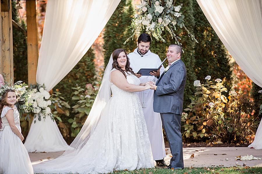 Exchanging vows at this Wedding at Castleton Farms by Knoxville Wedding Photographer, Amanda May Photos.