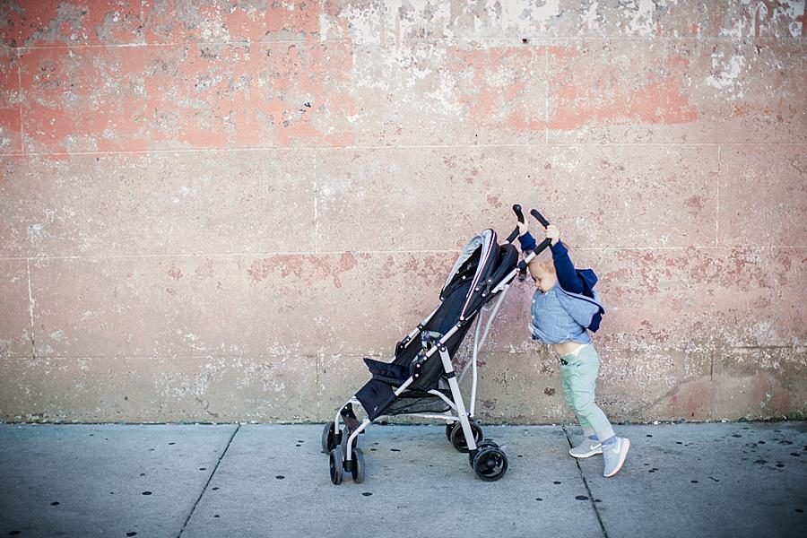 Pushing the stroller at this Charleston Session by Knoxville Wedding Photographer, Amanda May Photos.