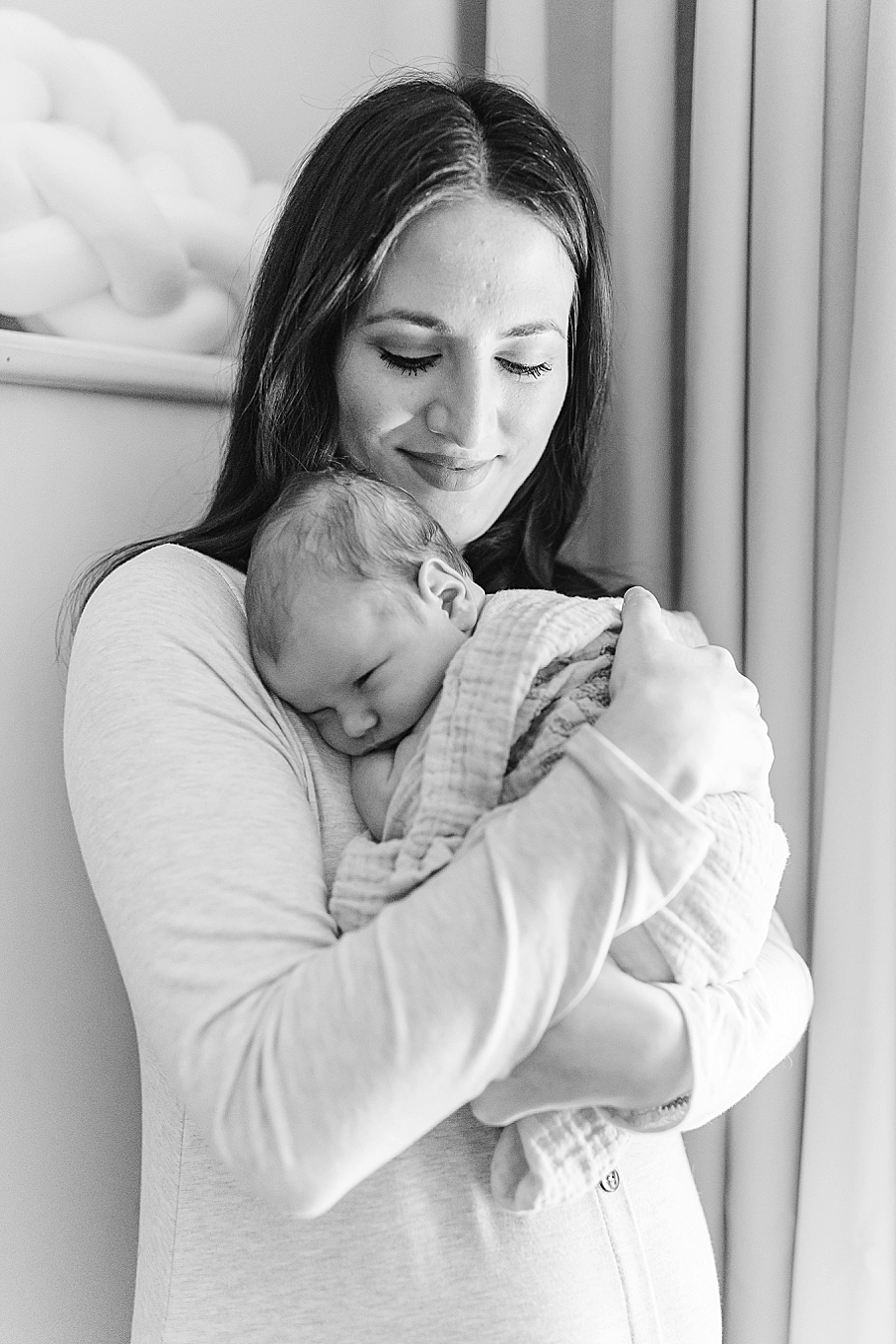 mom holding son cleveland newborn session