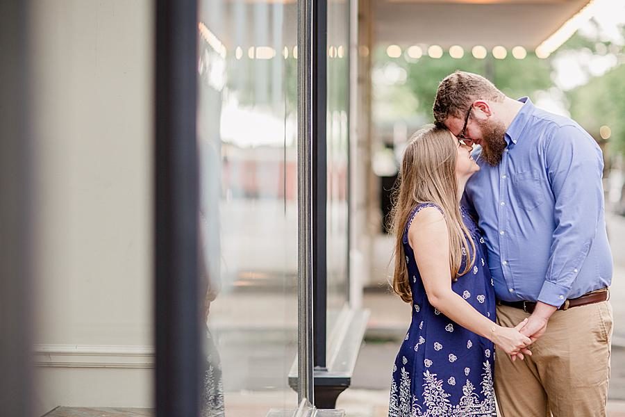 Window reflection at this downtown engagement by Knoxville Wedding Photographer, Amanda May Photos.