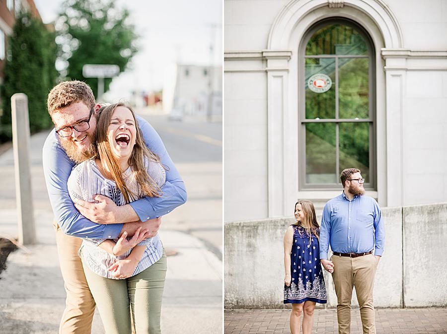 Looking away at this downtown engagement by Knoxville Wedding Photographer, Amanda May Photos.