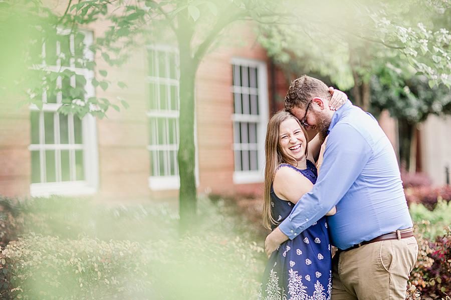 Through the leaves at this downtown engagement by Knoxville Wedding Photographer, Amanda May Photos.