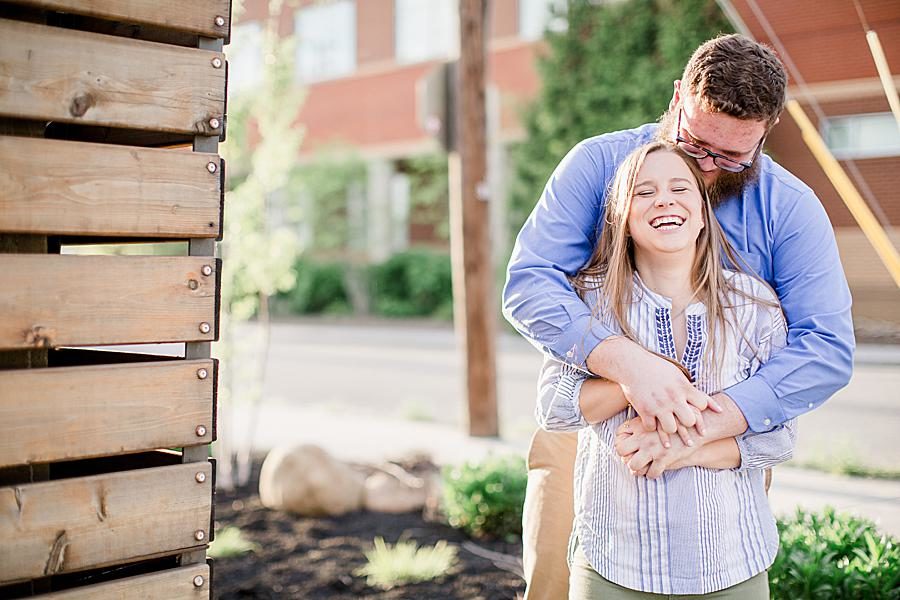 Smiles at this downtown engagement by Knoxville Wedding Photographer, Amanda May Photos.