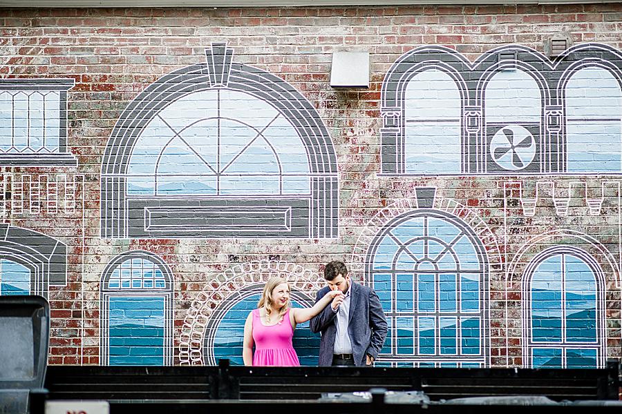 couple in front of building at downtown urban engagement