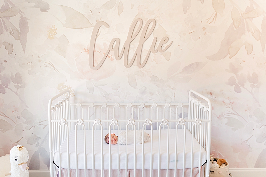 baby in white crib dreamy newborn session