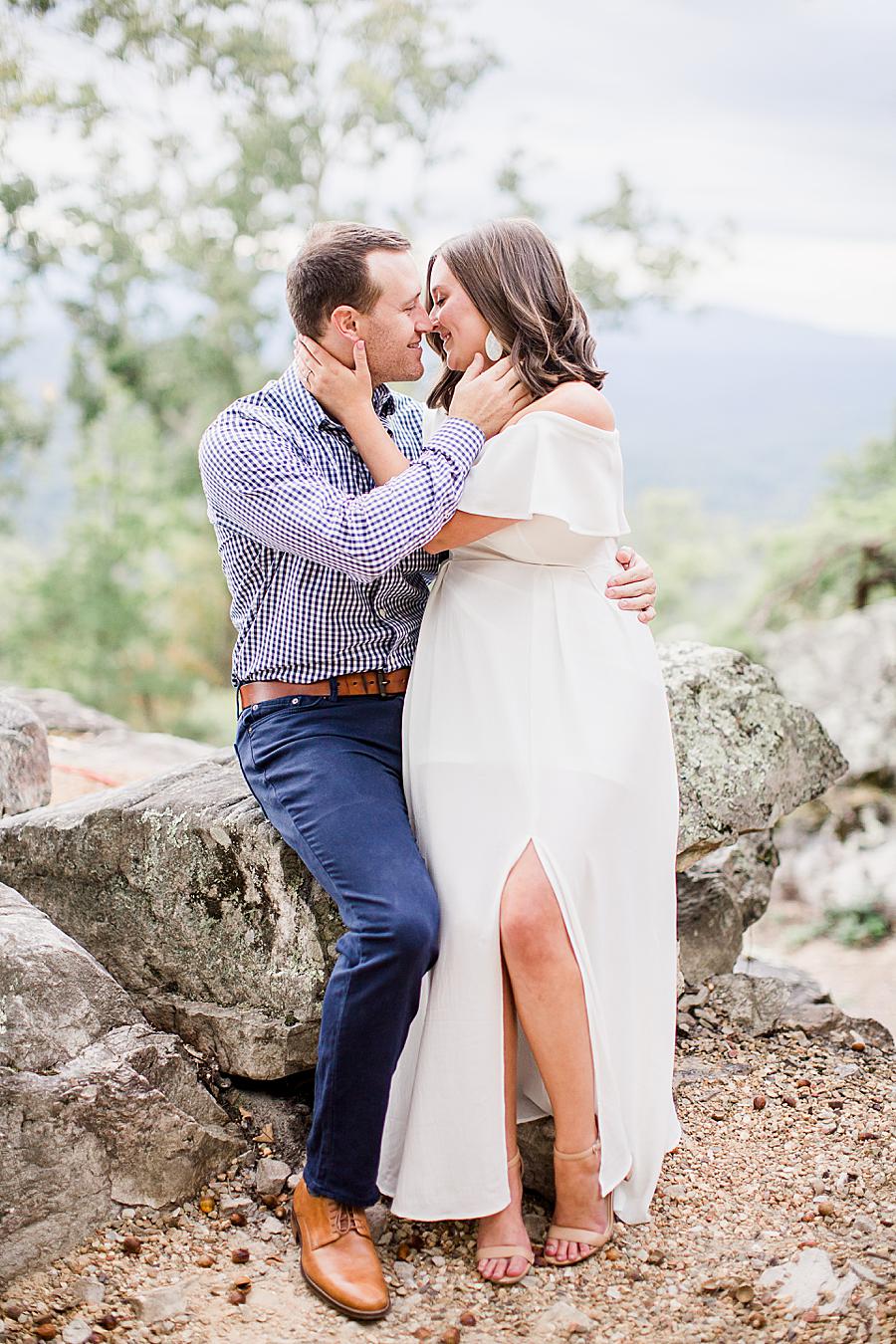 Sitting on lap at this Eagle Rock engagement by Knoxville Wedding Photographer, Amanda May Photos.