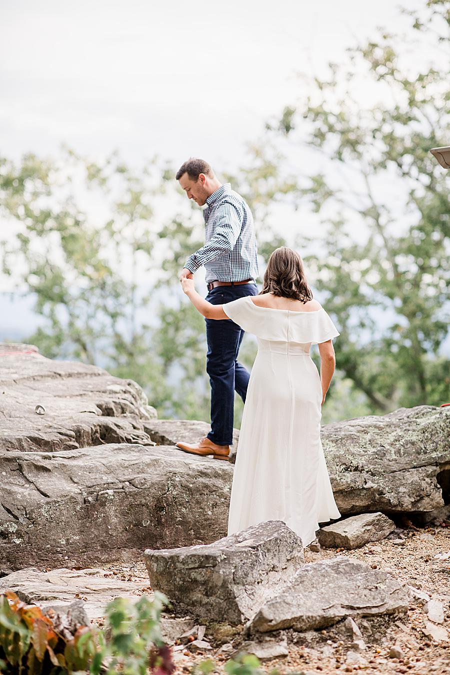 Hiking at this Eagle Rock engagement by Knoxville Wedding Photographer, Amanda May Photos.