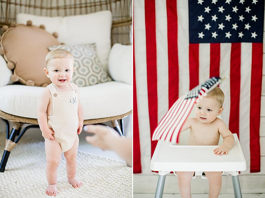 baby holding american flag