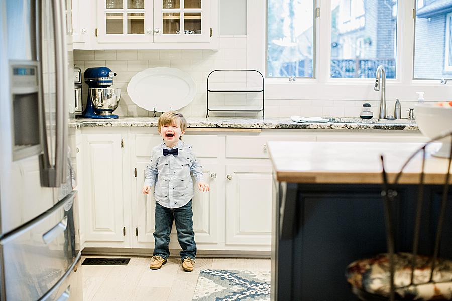 happy little boy in family kitchen