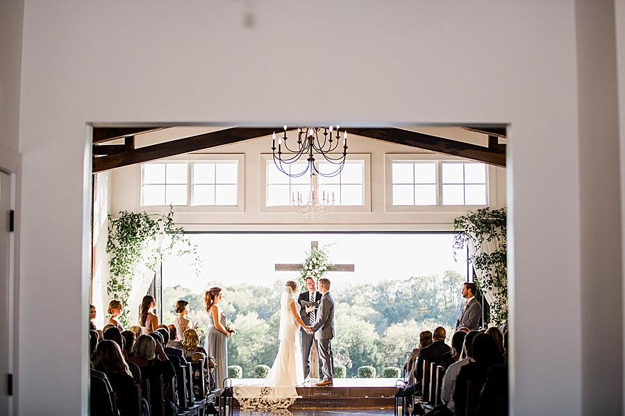 Exchanging rings at this Graystone Quarry wedding by Knoxville Wedding Photographer, Amanda May Photos.